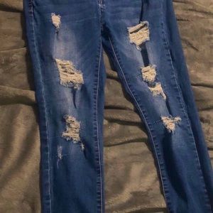 Blue Ripped Jeans. SIZE 5/6 (not sure inch)